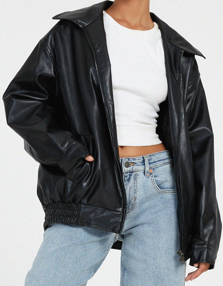 Veste en cuir mi-longue au style épuré