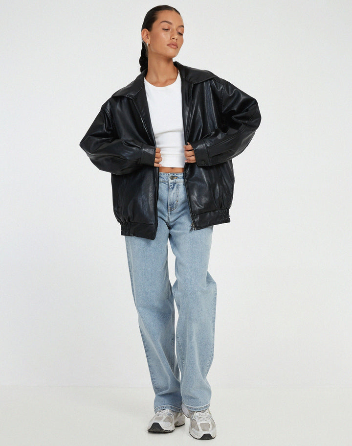 Veste en cuir mi-longue au style épuré