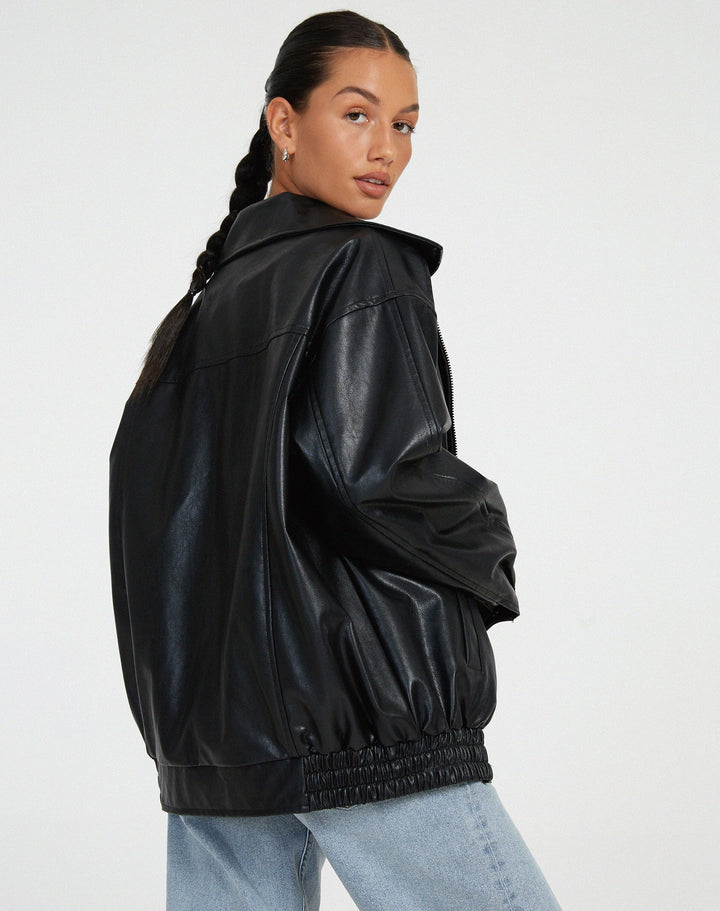 Veste en cuir mi-longue au style épuré