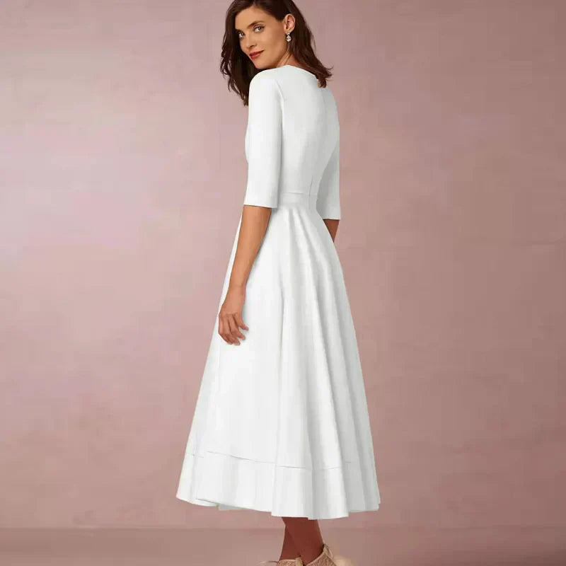 Robe midi élégante col V et manches 3/4