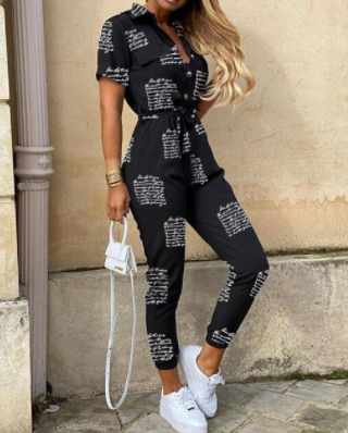 Jumpsuit en coton avec taille marquée et boutonnière