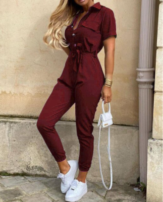 Jumpsuit en coton avec taille marquée et boutonnière