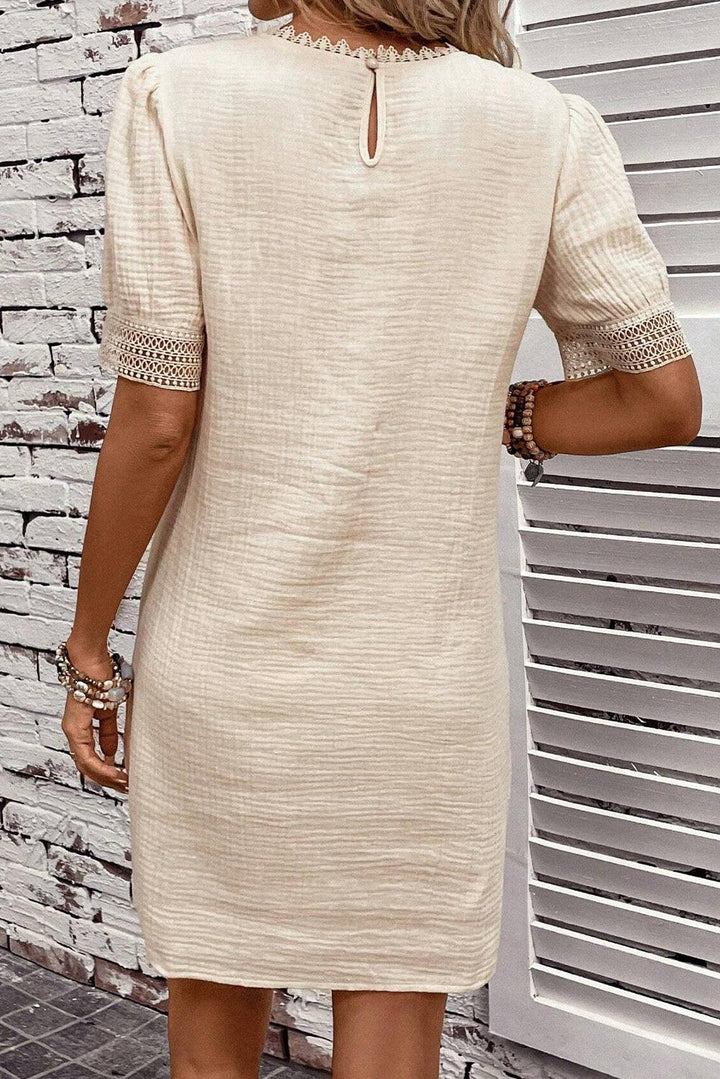 Robe courte fluide à manches bouffantes