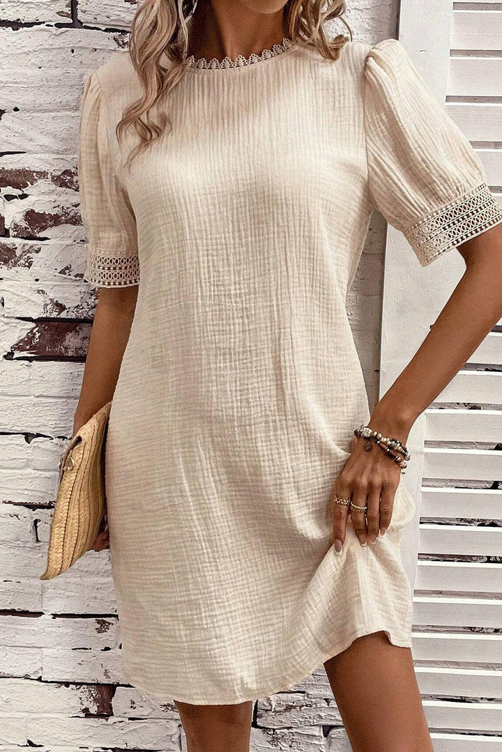 Robe courte fluide à manches bouffantes