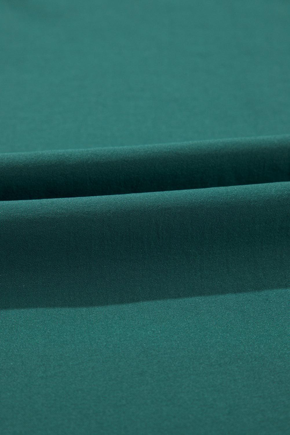 Robe longue fluide à ceinture