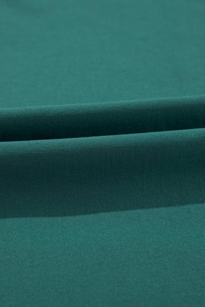 Robe longue fluide à ceinture