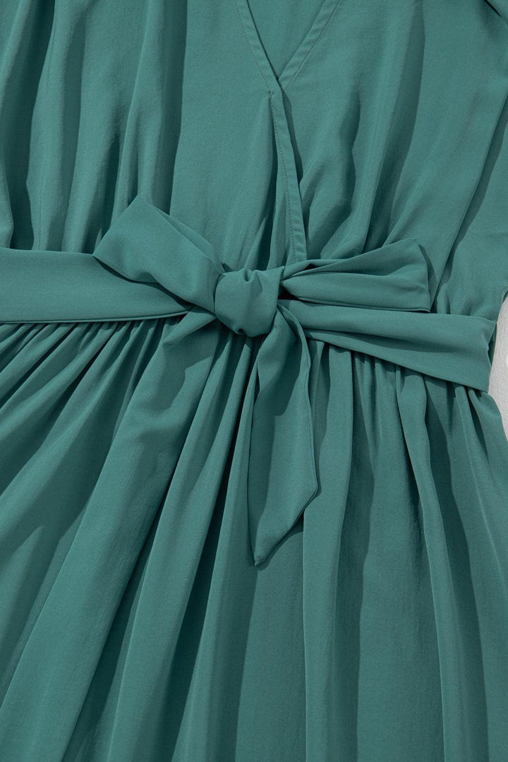 Robe longue fluide à ceinture