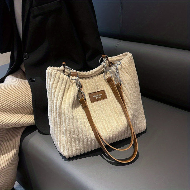 Sac bandoulière en velours côtelé avec anse réglable