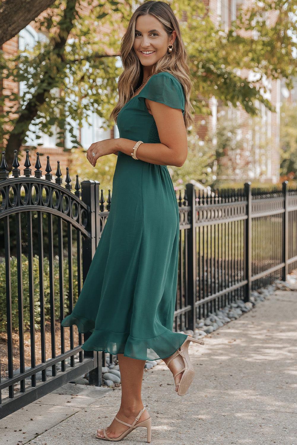 Robe midi fluide à dos ouvert