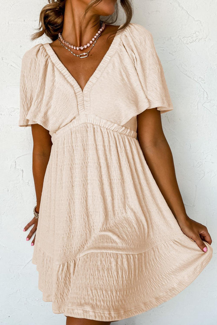 Robe courte fluide col V dos ouvert