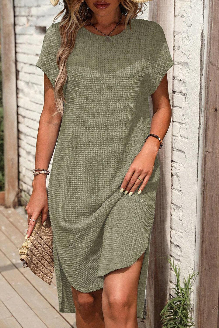 Robe fluide gaufrée à fente latérale