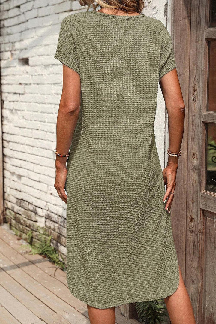 Robe fluide gaufrée à fente latérale